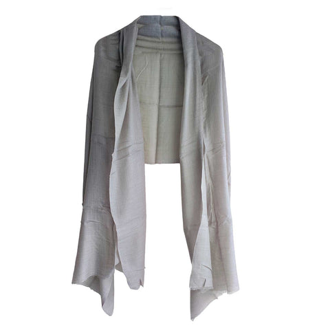 Light gray duster over a white background
