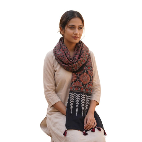 Black Ajrakh printed cotton stole ISAK16-13D — bold black with red orange cream motifs and tassels — Indiascarves