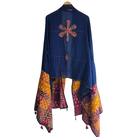 Close-up of hand mirror-work applique and Ajrakh patchwork border on navy blue dupatta