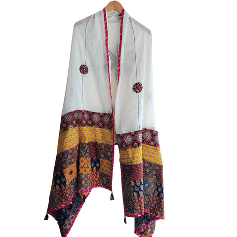 Close-up of hand mirror-work applique and Ajrakh patchwork border on ivory dupatta