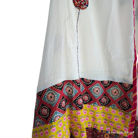 Close-up of hand mirror-work applique and Ajrakh patchwork border on ivory dupatta
