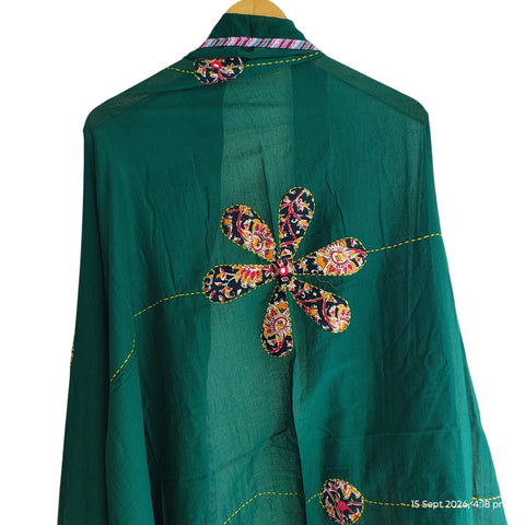 Close-up of hand mirror-work applique and Ajrakh patchwork border on bottle green dupatta