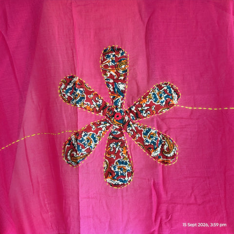 Close-up of hand mirror-work applique and Ajrakh patchwork border on rani pink dupatta