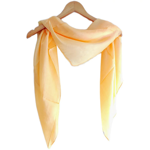 Pastel peach pure silk square scarf draped on hanger — lightweight Varanasi silk hair scarf, 100×100 cm