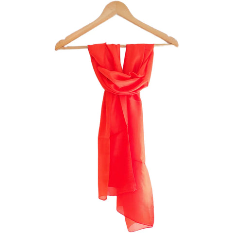 Close-up of tomato red Varanasi silk stole texture — smooth lustrous plain weave silk