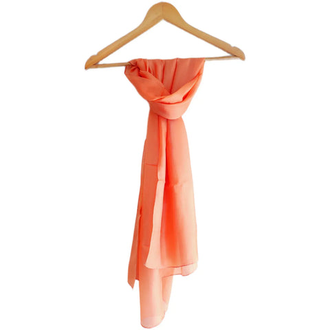 Close-up of peach Varanasi silk stole texture — warm tone plain weave pure silk