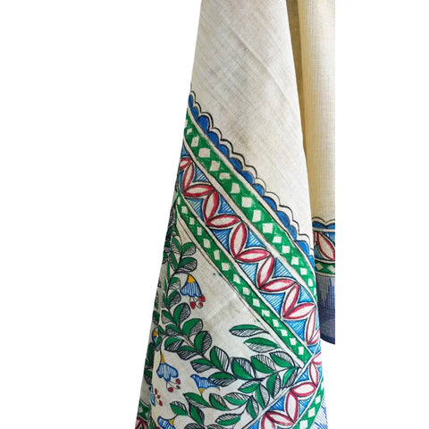 Close-up of hand painted peacock and fish motif on blue cotton silk Madhubani dupatta