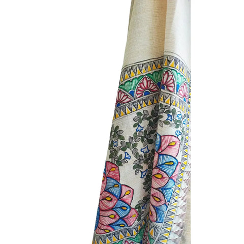 Close-up of hand painted grey peacock motif Madhubani art on cotton silk fabric