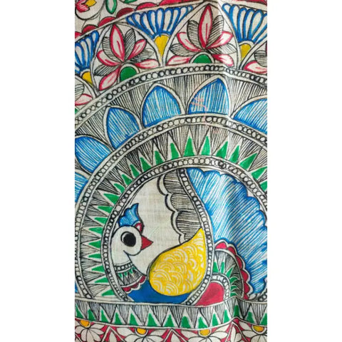 Close-up of hand painted peacock mandala motif on mustard Madhubani art dupatta