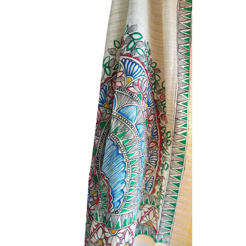 Mustard Madhubani dupatta with peacock mandala draped over traditional outfit