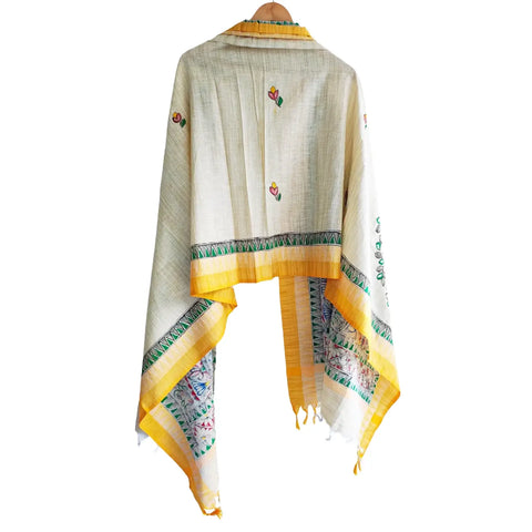 Close-up of hand painted peacock mandala motif on mustard Madhubani art dupatta