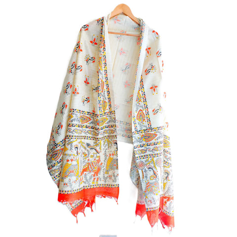 Orange Madhubani printed dupatta draped over ethnic outfit — vibrant styling
