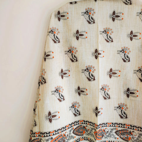 Close-up of Madhubani art print motif pattern on chocolate brown khadi silk dupatta