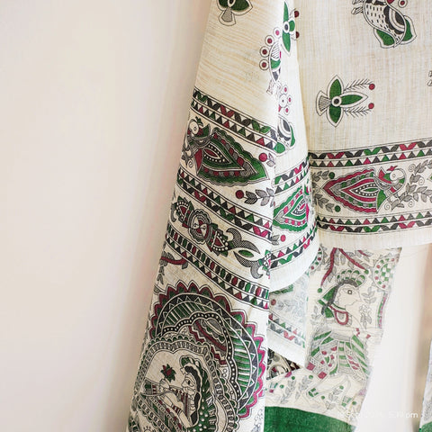 Close-up of Madhubani art print motif pattern on forest green khadi silk dupatta