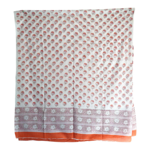 Close-up of rust orange floral buti Sanganeri block print on white mul cotton – ISYVSK-A03
