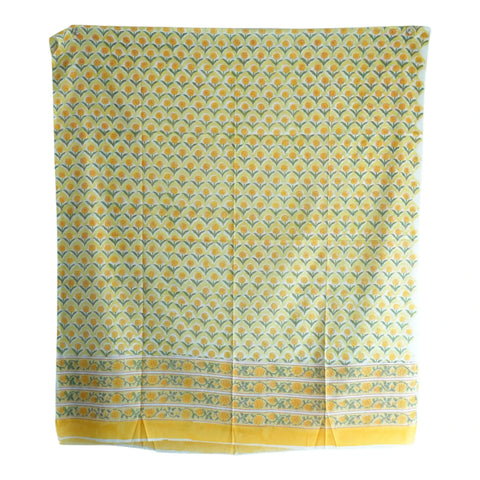 Close-up of yellow marigold Sanganeri hand block print on white mul cotton – ISYVSK-A04